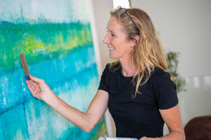 Artist painting artwork - Studio 2 Art & Design