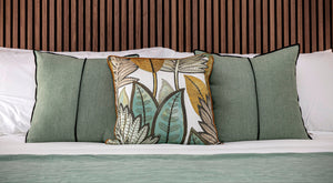 Matching set of cushions on bed - Studio 2 Art & Design