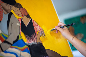 Artist painting artwork yellow back ground - Studio 2 Art & Design