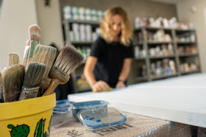 Brushes and artist in art studio - Studio 2 Art & Design